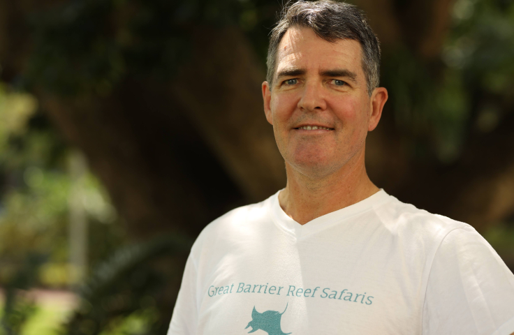 Stuart alexander wearing a t-shirt with "Great Barrier Reef Safaris" 