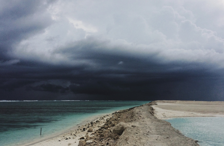 Dark storms over a beach 